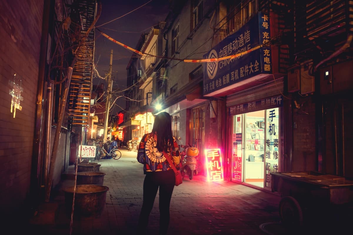 Street guitarist performing at night